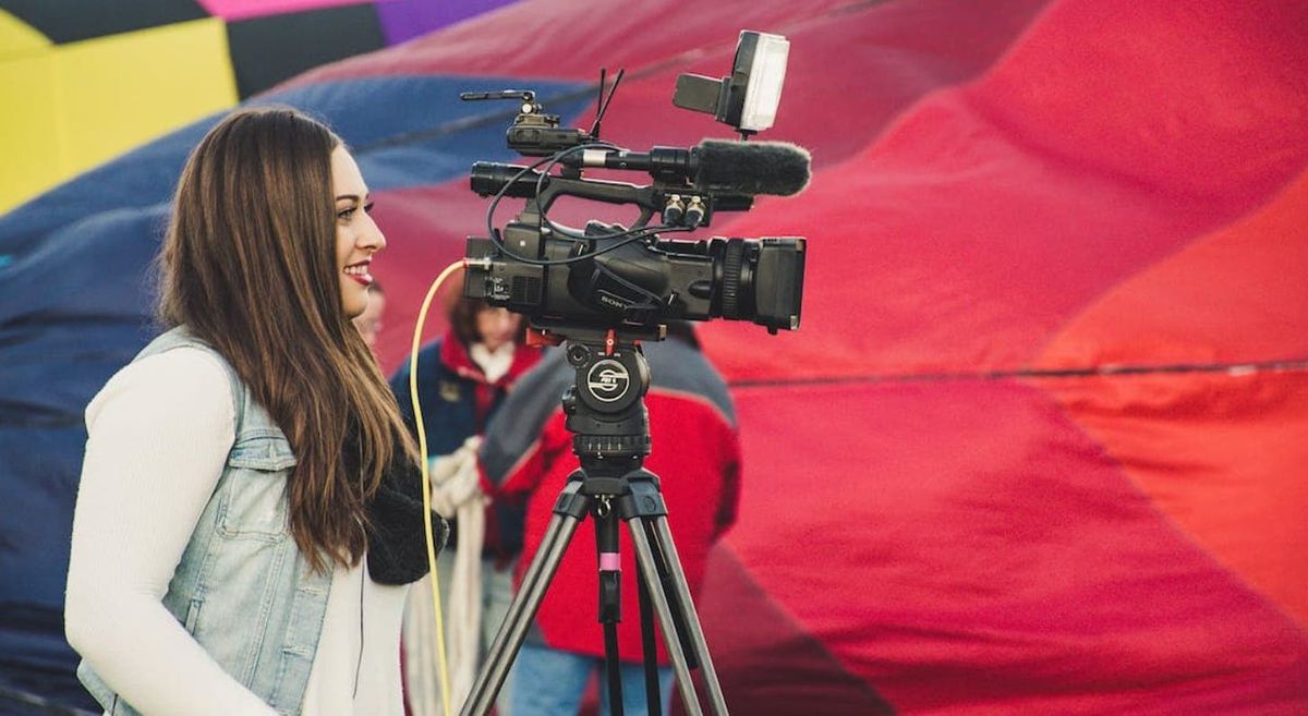 Woman behind camera